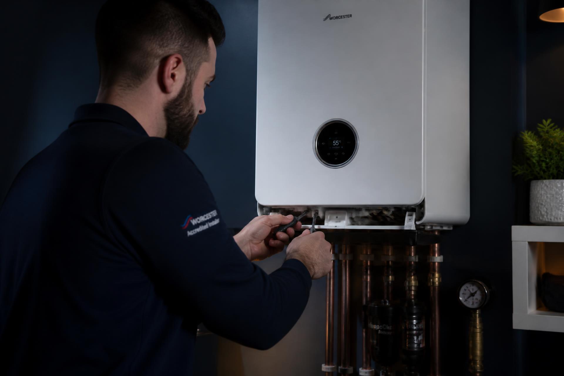 Gas Safe engineer servicing a boiler
